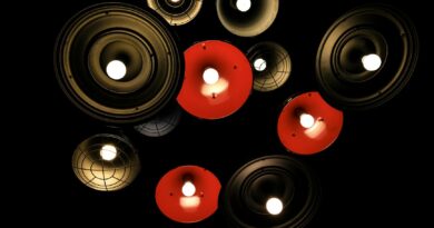 A beautifully designed modern smart lamp in a warm living room.