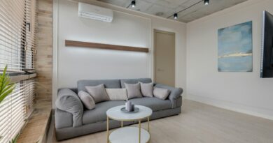 A clean, minimalist living room with understated smart home devices