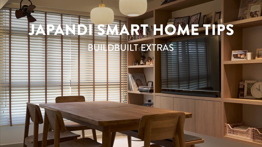 A beautifully designed Japandi living room with warm oak flooring, minimalist furniture, and soft ambient lighting.