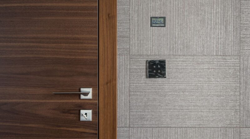 A modern smart thermostat adjusting temperature